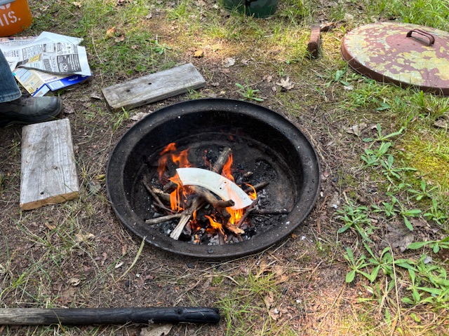photo of fire pit with fire in it