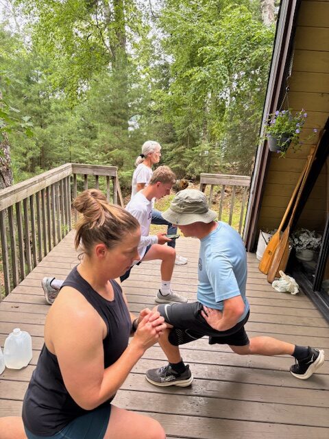 people doing lunges on a porch for exercise