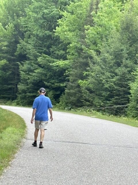 main walking on road