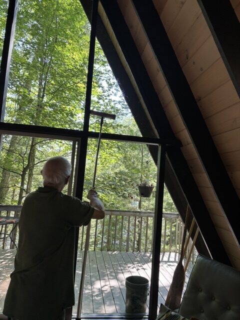 man washing windows